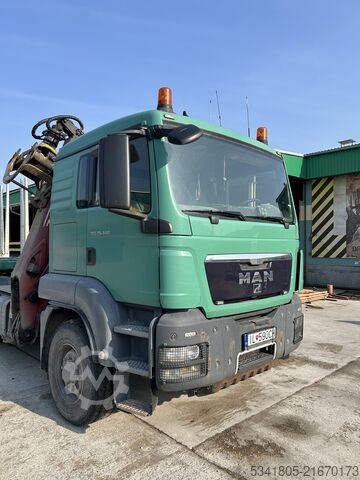 LOGS CARRYING MAN TRUCK MAN 