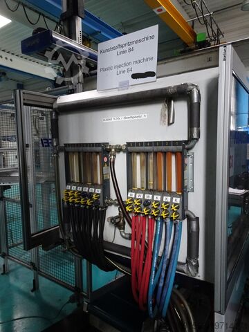 Máquina de moldagem por injecção KraussMaffei KM125 520 C1