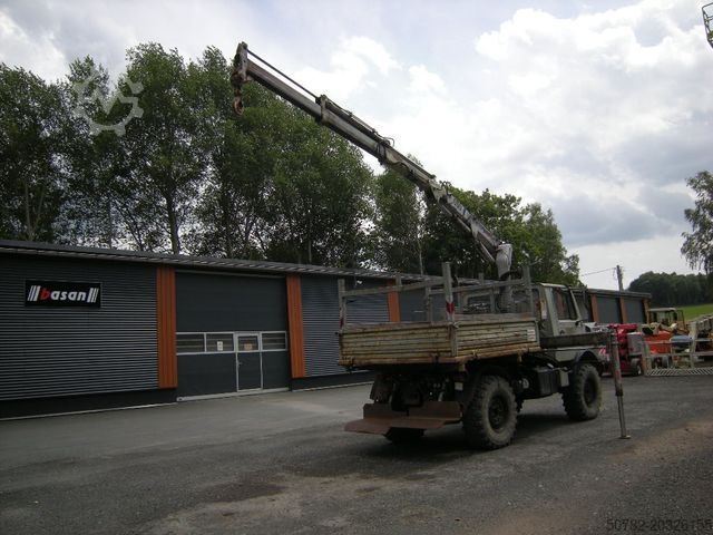Trójstronna wywrotka UNIMOG Unimog U1250 mit Kran