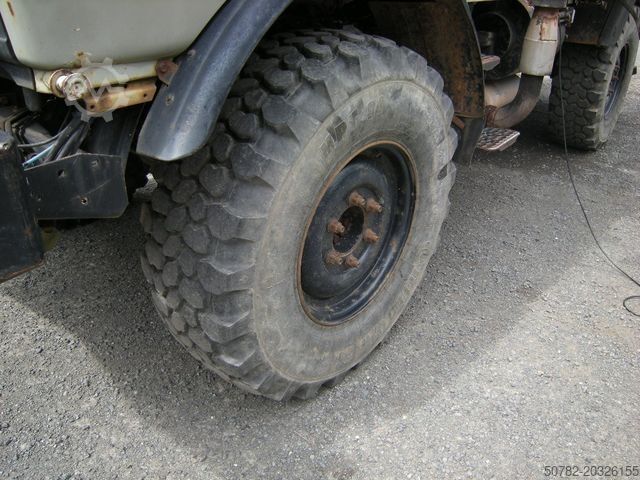 Trójstronna wywrotka UNIMOG Unimog U1250 mit Kran