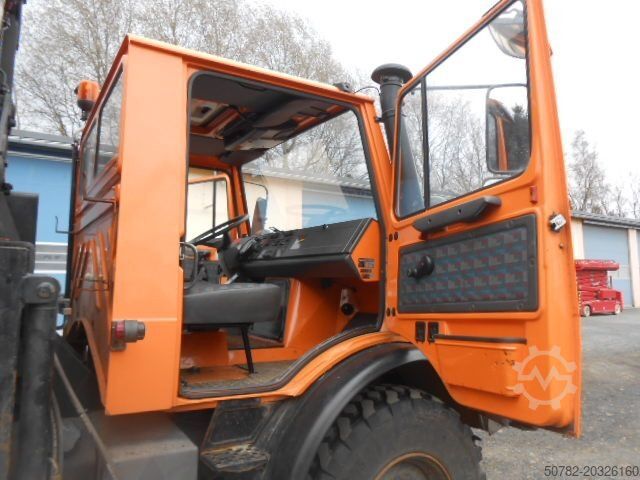 Kiper kamion UNIMOG U1450 427/11 mit Kran