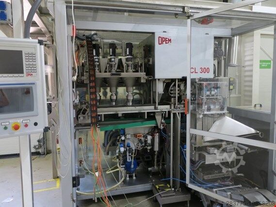 Machine de fabrication de gousses et machine d'emballage Opem CL 300