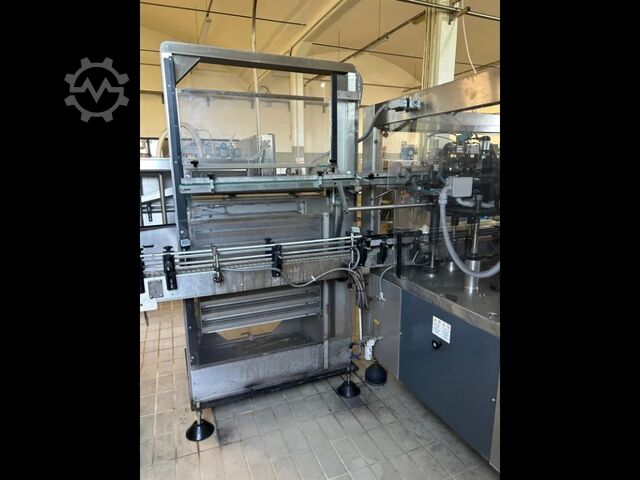 Brugt nøglefærdig vinpåfyldningslinje til glas, kapacitet 16.000 flasker/timen, årgang 2005, model . Cames MASTER TRONIC 40/48/8-8