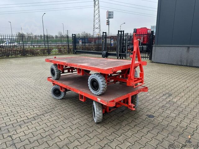 Platform vrachtwagen Mafi stack of 2x double-steered and connectable heav...