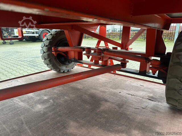 Platform vrachtwagen Mafi stack of 2x double-steered and connectable heav...