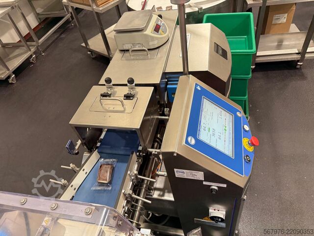 Verpackungslinie Fuji Packaging / Loma Systems FW3410 Muffin/Cake/Brownie Packing Line