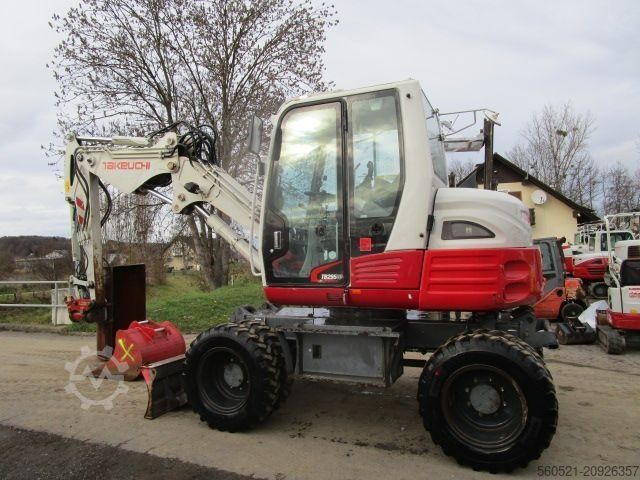 Kolový bagr Takeuchi TB 295W - POWERTILT + Schnellw + 3 Löffel