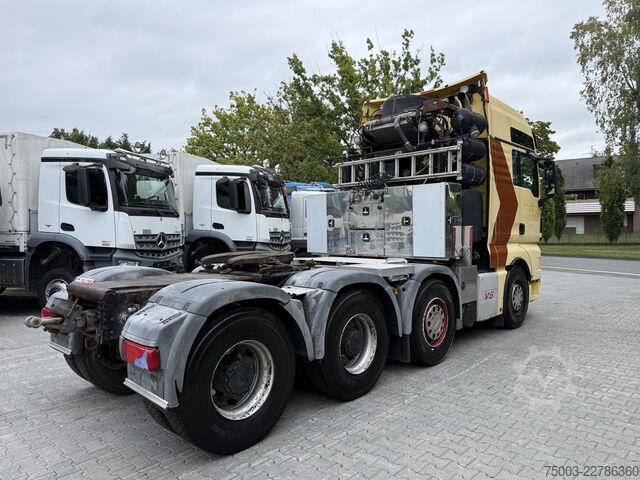Ciężarówka ciężkiego typu MAN TGX 41.680 8X4/4 BBS 250.000 Kg