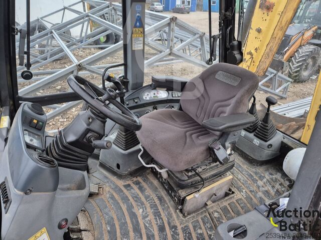 Backhoe loader New Holland B 115 C