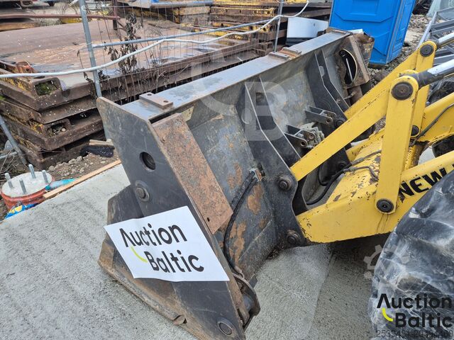 Backhoe loader New Holland B 115 C