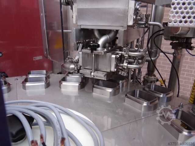 Riempitrice/confezionatrice per vassoi Waldner Dosomat 18