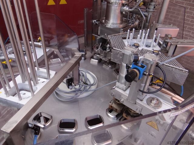 Riempitrice/confezionatrice per vassoi Waldner Dosomat 18