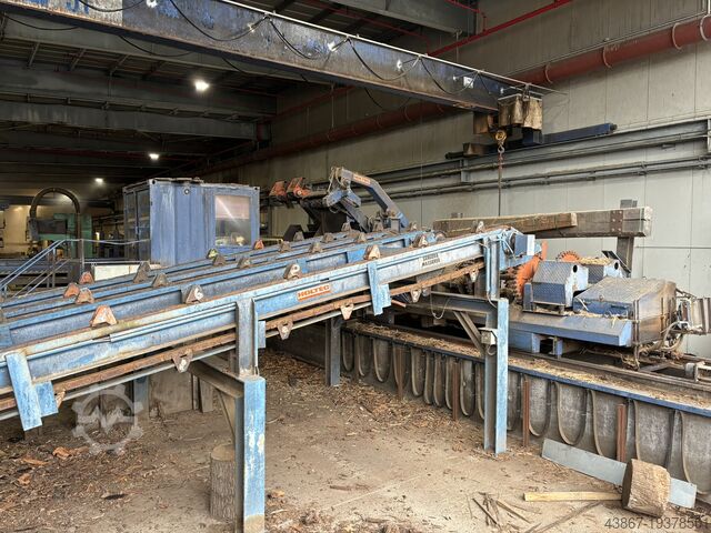 Debarking machine with root reducer Baljer & Zembrod