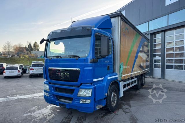 Flatbed truck with tarp MAN TGS 26.440 6x2 LBW