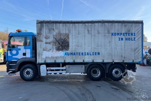 Flatbed truck with tarp MAN TGA 26.440 6x2