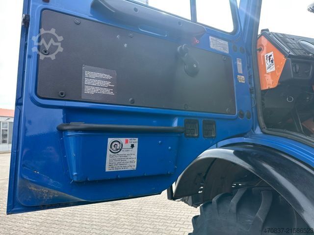 Ciężarówka z płaską platformą UNIMOG U 427 4x4 / Kran Atlas 130 / Winde