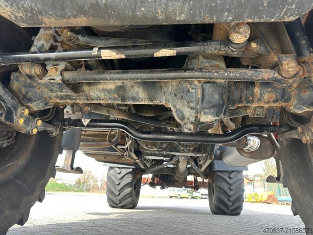 Ciężarówka z płaską platformą UNIMOG U 427 4x4 / Kran Atlas 130 / Winde