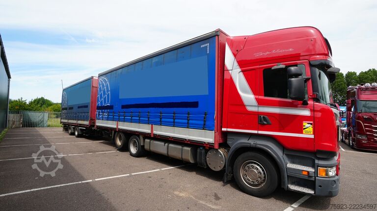 Prelata glisantă Scania R 400 6x2 curtainside in combo with Burg trailer