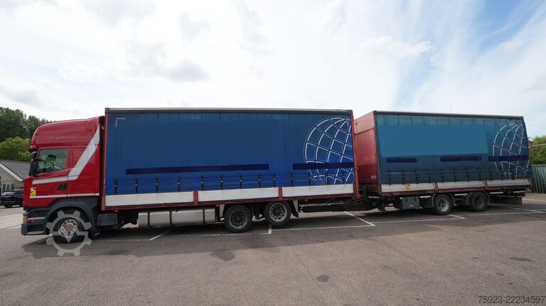 Prelata glisantă Scania R 400 6x2 curtainside in combo with Burg trailer
