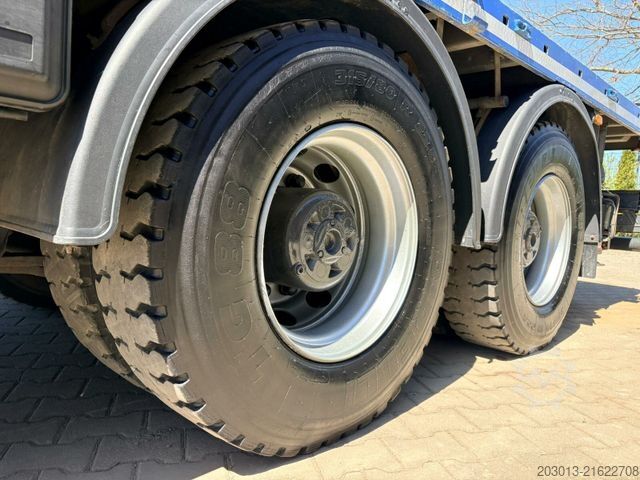 Camión de plataforma SCANIA G450 8x4 Pritsche mit Kran Palfinger PK76002 EH