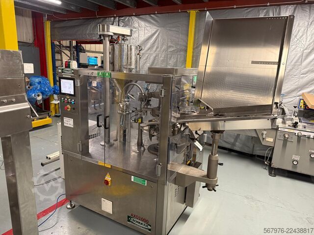 Sistema completo di riempimento e sigillatura tubi Complete Axomatic Tube Filling and Sealing System