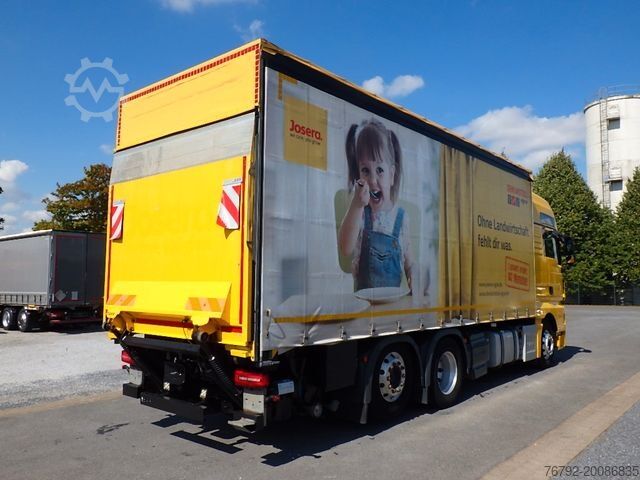 Camion cu platformă și prelată MAN TGX 26.460 LL XXL/Ret/Pritsche/Heitling/Kompress