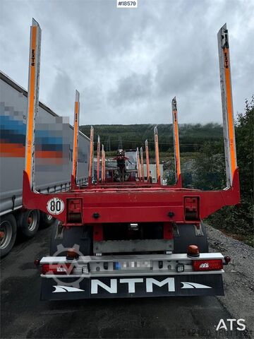 Huttner houttrailer met 17 t/m Epsilon kraan en uitschuifdeel Huttner Timber trailer w/ 17 t/m Epsilon crane and extensi