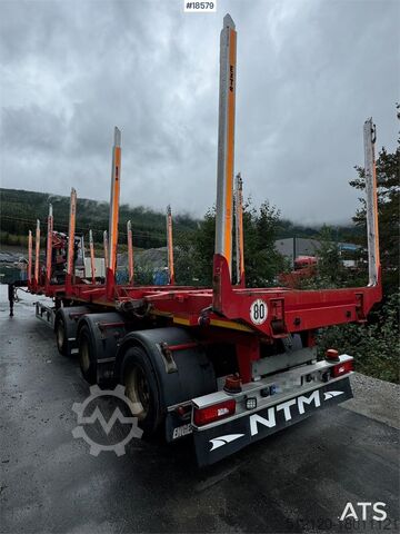 Huttner houttrailer met 17 t/m Epsilon kraan en uitschuifdeel Huttner Timber trailer w/ 17 t/m Epsilon crane and extensi