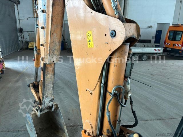 Backhoe loader JCB 4 CX / Baggerlader Skip / German