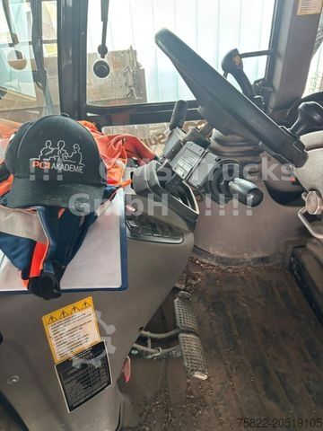 Backhoe loader JCB 4 CX / Baggerlader Skip / German