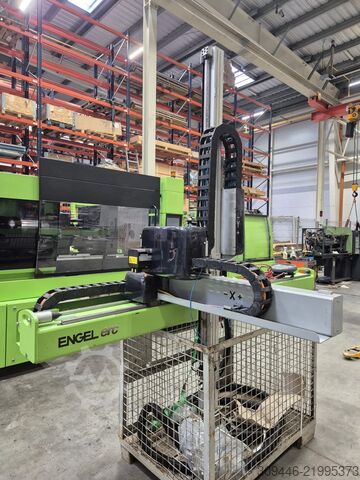 Macchina per stampaggio a iniezione ENGEL Victory 1350/200 + Robot