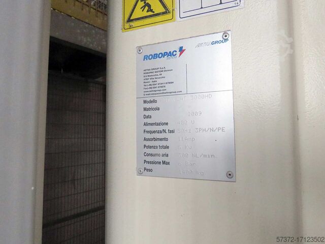 Sistema de llenado de cubos y paletización Vollenda/Robopac/Ehcolo Rotoplat 3000 HD/Motoman EPL 160