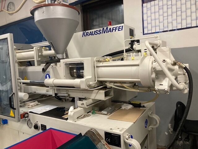 Máquina de moldagem por injeção KraussMaffei KM125-700C1