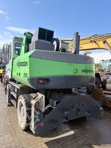 Mobiele graafmachine SENNEBOGEN 818 mit Greifer