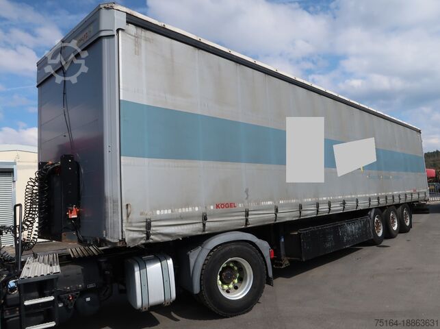 Pótkocsi platóval és ponyvával Kögel S24-1