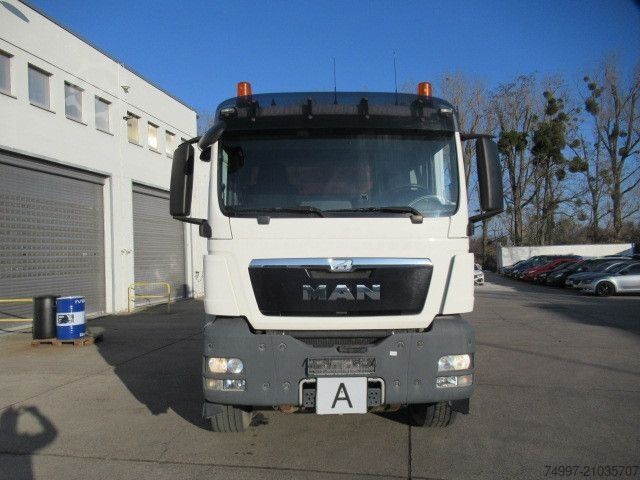 Tipper truck MAN 26.440 / 6 x 4 / Jonsered 1100 / Greifer