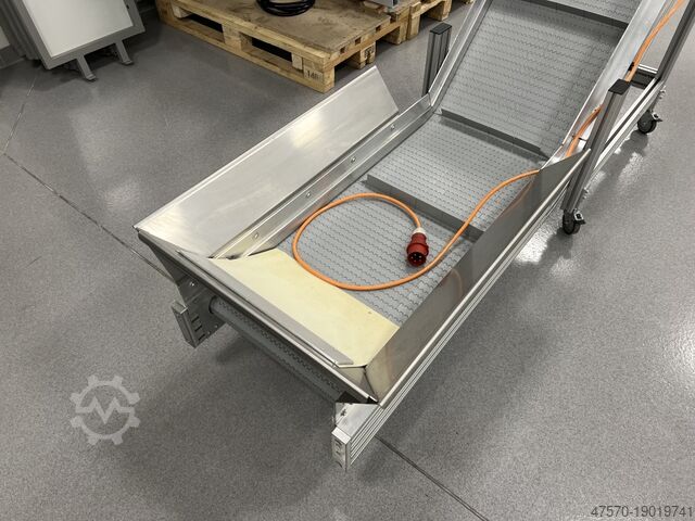 Stansmes Conveyor belt for waste removal from guillotine, three-knife trimmer