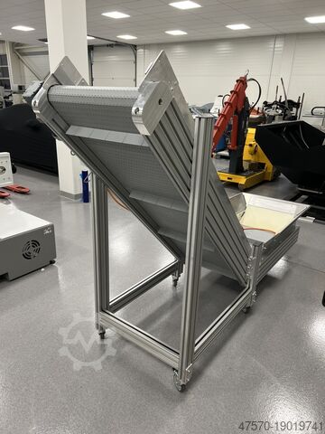 Stansmes Conveyor belt for waste removal from guillotine, three-knife trimmer