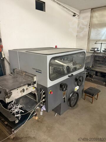 Sedlářský steh Heidelberg Stitchmaster ST 300