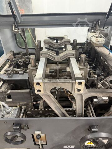 Sedlářský steh Heidelberg Stitchmaster ST 300