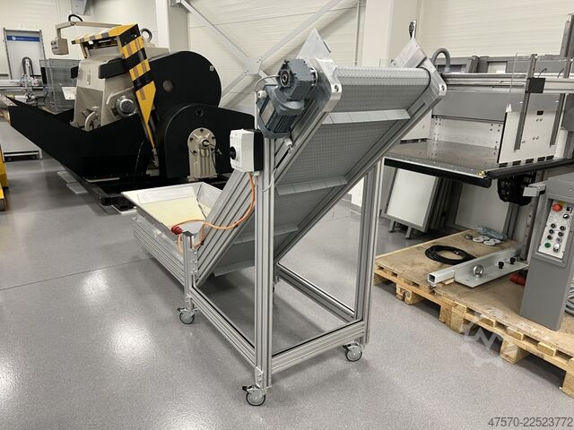 Stanzmaschine Conveyor belt for waste removal from guillotine, three-knife trimmer