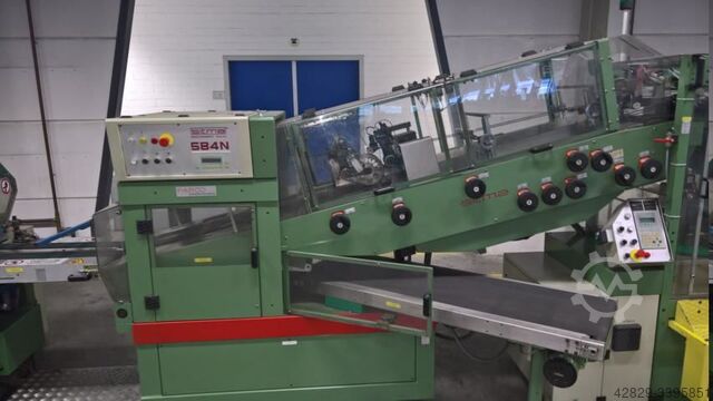 Machine met inwikkeling dev film invoegen Sitma 950