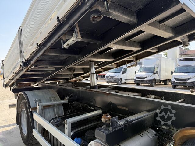 Camión volquete trilateral Iveco Eurocargo 140E18