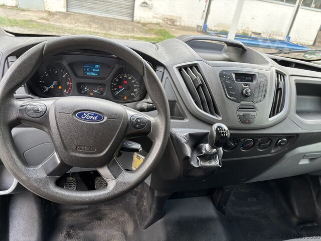 Transporter mit Koffer Ford Transit 350